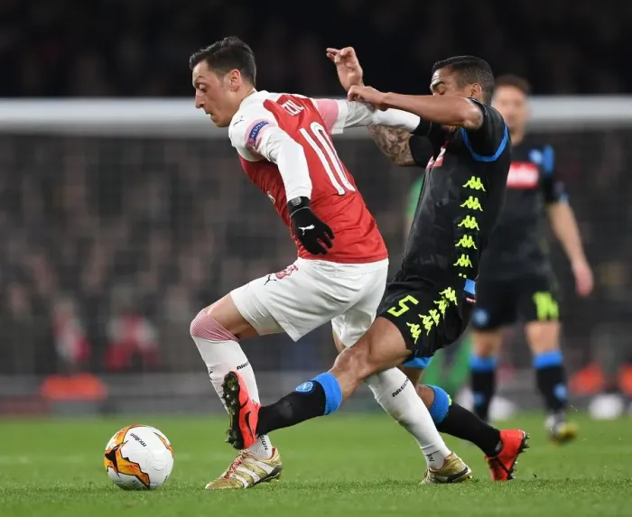 Framed Print : Arsenal vs. Napoli: Ozil Clashes with Allan in Europa League Quarterfinal