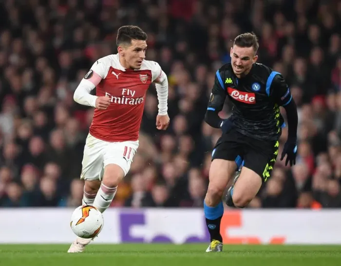 Framed Print : Arsenal vs. Napoli: Torreira Tackles Past Fabian Ruiz in Europa League Quarterfinal Clash Framed Print : Arsenal vs. Napoli: Torreira Tackles Past Fabian Ruiz in Europa League Quarterfinal Clash