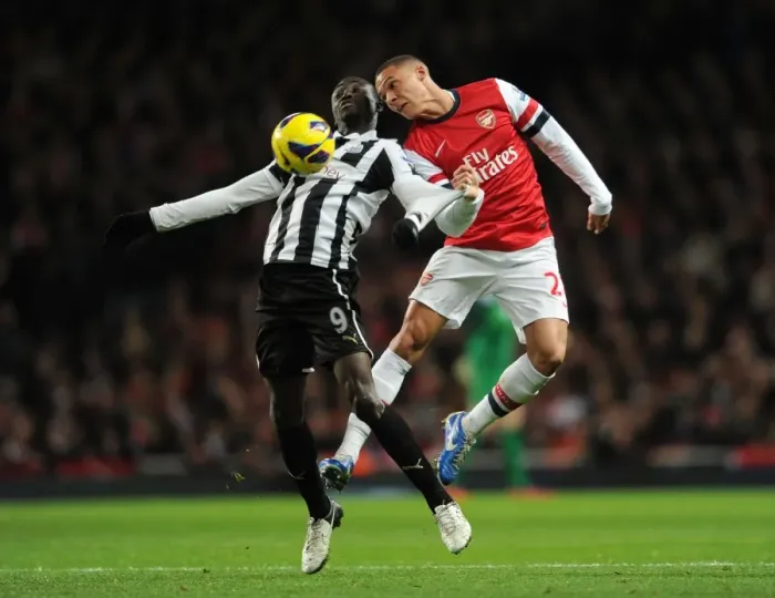 Framed Print : Arsenal vs Newcastle United: Clash Between Kieran Gibbs and Papiss Cisse Framed Print : Arsenal vs Newcastle United: Clash Between Kieran Gibbs and Papiss Cisse