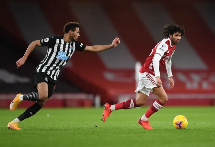 Framed Print : Arsenal vs Newcastle United: Elneny Takes on Joelinton in Empty Emirates Stadium, Premier League 2021