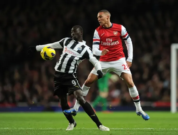 Framed Print : Arsenal vs Newcastle United: Kieran Gibbs vs Papiss Cisse - Intense Battle in the Premier League Framed Print : Arsenal vs Newcastle United: Kieran Gibbs vs Papiss Cisse - Intense Battle in the Premier League