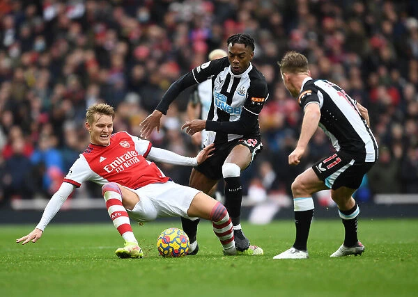 Arsenal vs Newcastle United: Martin Odegaard Clashes with Joe Willock in Premier League Showdown