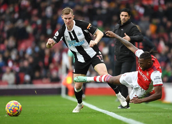 Arsenal vs Newcastle United: Nuno Tavares Fouls Emil Krafth in Intense Premier League Clash