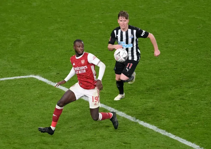 Framed Print : Arsenal vs Newcastle United: Pepe Faces Off Against Ritchie in FA Cup Clash