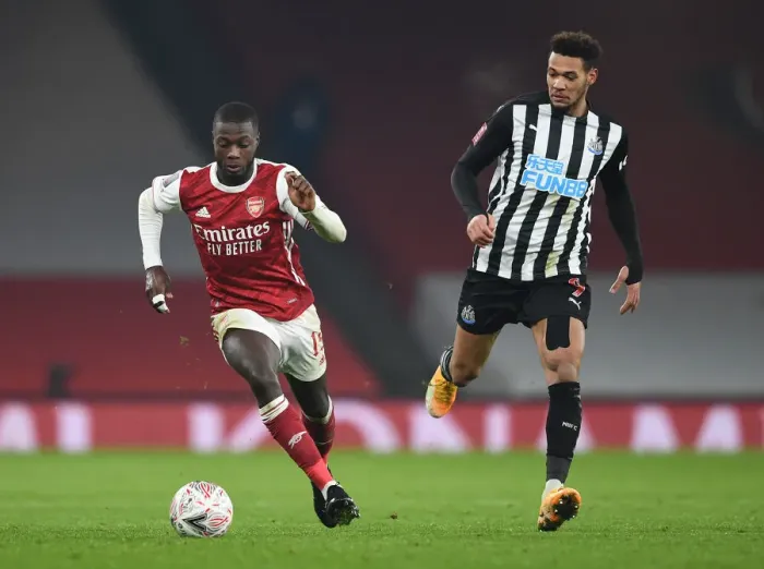 Framed Print : Arsenal vs Newcastle United: Pepe vs Joelinton Clash in FA Cup Third Round