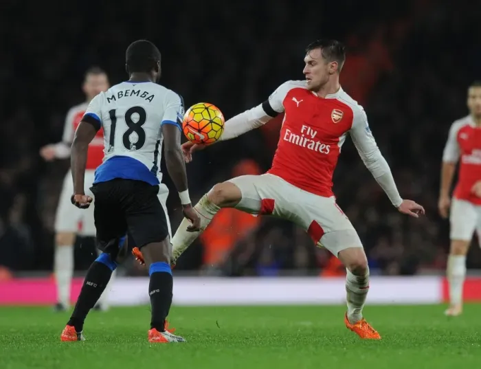 Framed Print : Arsenal vs Newcastle United: Ramsey vs Mbemba's Intense Battle in the Premier League