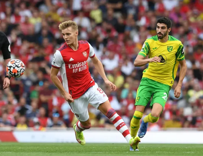 Framed Print : Arsenal vs Norwich City: Martin Odegaard Clashes with Pierre Lees-Melou in the 2021-22 Premier League Framed Print : Arsenal vs Norwich City: Martin Odegaard Clashes with Pierre Lees-Melou in the 2021-22 Premier League