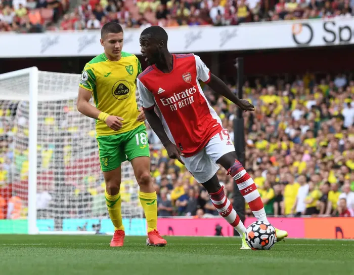 Framed Print : Arsenal vs Norwich City: Pepe Clashes with Tzolis in Premier League Showdown Framed Print : Arsenal vs Norwich City: Pepe Clashes with Tzolis in Premier League Showdown