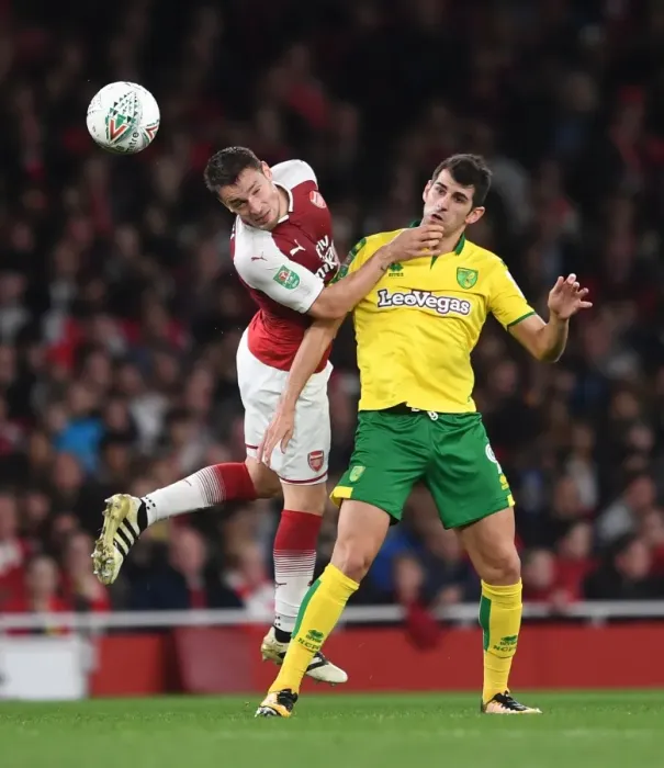 Framed Print : Arsenal vs Norwich: Debuchy Heads Away from Oliveira in Carabao Cup Clash Framed Print : Arsenal vs Norwich: Debuchy Heads Away from Oliveira in Carabao Cup Clash