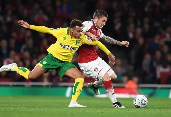 Arsenal vs. Norwich: Debuchy Holds Off Murphy in Carabao Cup Clash