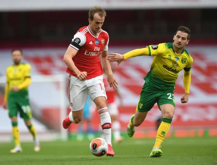 Framed Print : Arsenal vs Norwich: Rob Holding Clashes with Kenny McLean in Premier League Showdown Framed Print : Arsenal vs Norwich: Rob Holding Clashes with Kenny McLean in Premier League Showdown