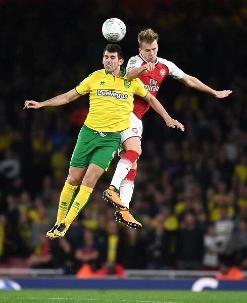 Arsenal vs Norwich: Rob Holding Leaps Over Mario Vrancic in Carabao Cup Clash