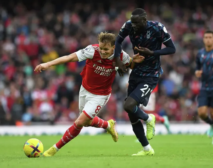 Framed Print : Arsenal vs. Nottingham Forest: Martin Odegaard Clashes with Cheikhou Kouyate in the 2022-23 Premier League Framed Print : Arsenal vs. Nottingham Forest: Martin Odegaard Clashes with Cheikhou Kouyate in the 2022-23 Premier League