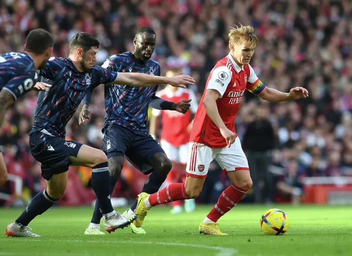 Framed Print : Arsenal vs. Nottingham Forest: A Tense Showdown - Odegaard Goes Head-to-Head with Kouyate and McKenna Framed Print : Arsenal vs. Nottingham Forest: A Tense Showdown - Odegaard Goes Head-to-Head with Kouyate and McKenna