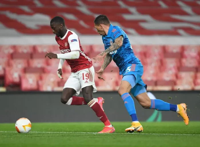 Framed Print : Arsenal vs Olympiacos: Pepe Clashes with Holebas in Empty Europa League Match, London, 2021