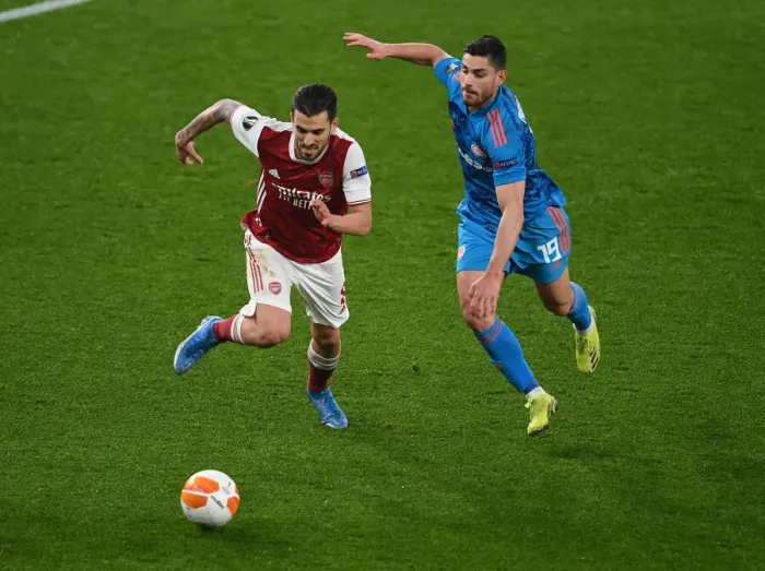 Framed Print : Arsenal vs Olympiacos: Empty Seats Showdown - Europa League 2021, Arsenal's Battle at the Ghostly Emirates Stadium, London