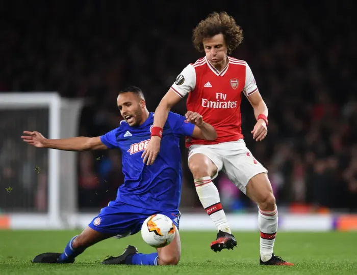 Framed Print : Arsenal vs Olympiacos Showdown: David Luiz vs Youssef El Arabi - Europa League Battle Framed Print : Arsenal vs Olympiacos Showdown: David Luiz vs Youssef El Arabi - Europa League Battle