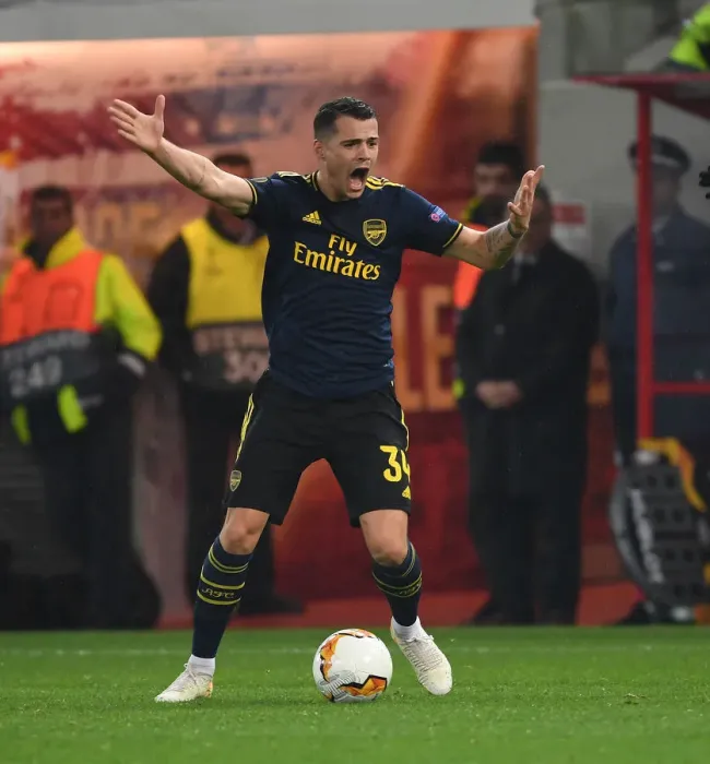 Framed Print : Arsenal vs. Olympiacos: UEFA Europa League Showdown - Arsenal Players in Action (2020)