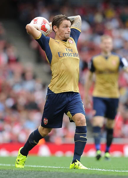 Arsenal vs. Olympique Lyonnais: Mathieu Debuchy in Action at the Emirates Cup