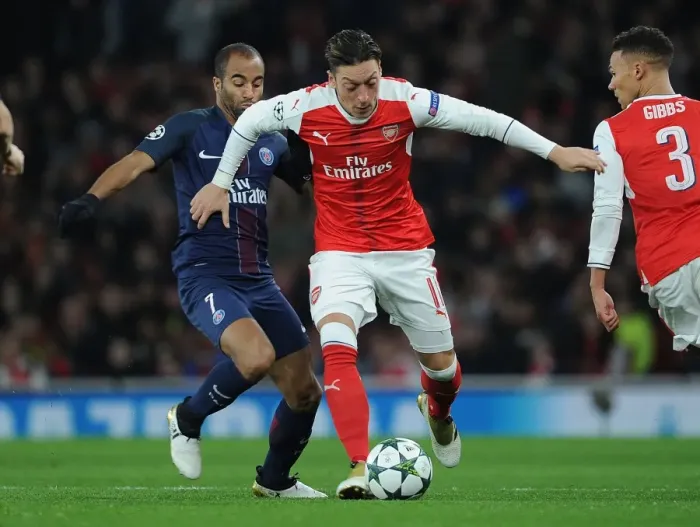 Framed Print : Arsenal vs Paris Saint-Germain: Mesut Ozil Breaks Through PSG Defense in 2016-17 Champions League Clash