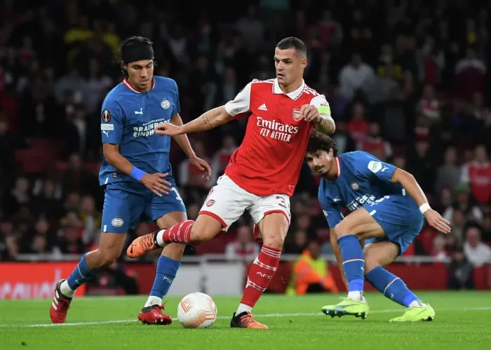Framed Print : Arsenal vs PSV Eindhoven: Granit Xhaka Fends Off Pressure in Europa League Clash Framed Print : Arsenal vs PSV Eindhoven: Granit Xhaka Fends Off Pressure in Europa League Clash