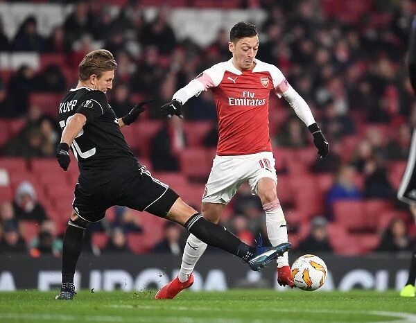 Arsenal vs Qarabag: Mesut Ozil Clashes with Jakub Rzezniczak in Europa League Match
