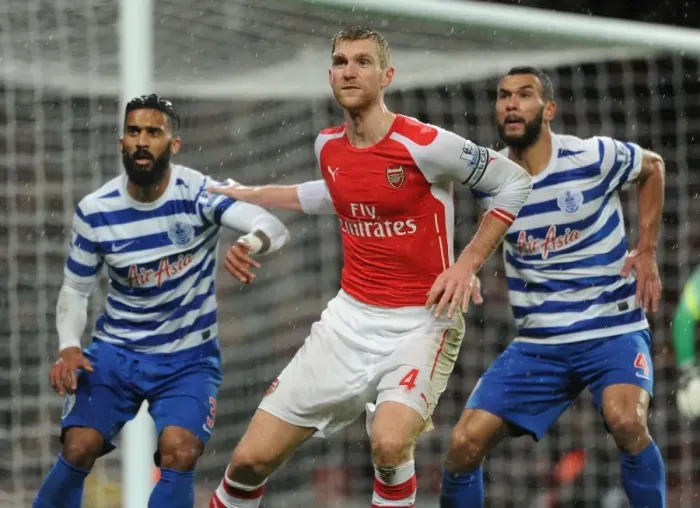 Framed Print : Arsenal vs. Queens Park Rangers: Per Mertesacker Faces Off Against Armand Traore and Steven Caulker Framed Print : Arsenal vs. Queens Park Rangers: Per Mertesacker Faces Off Against Armand Traore and Steven Caulker