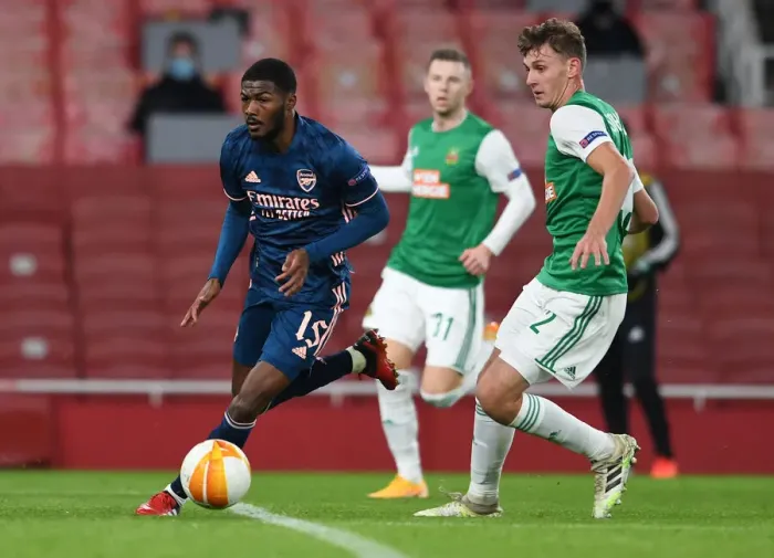 Framed Print : Arsenal vs Rapid Wien: Ainsley Maitland-Niles Clashes with Lion Schuster in Europa League Showdown