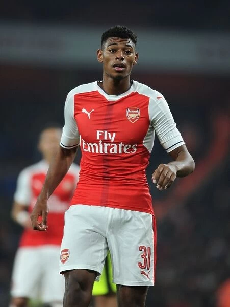 Arsenal vs Reading: EFL Cup Showdown - Jeff Reine-Adelaide in Action