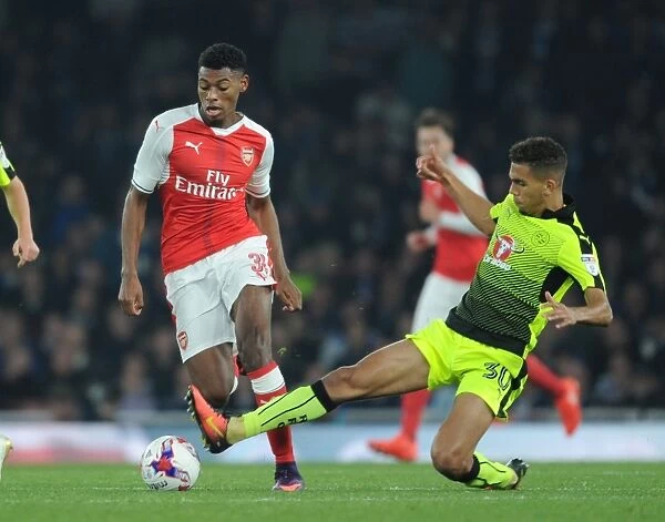 Arsenal vs Reading: Jeff Reine-Adelaide Clashes with Tennai Watson in EFL Cup Showdown