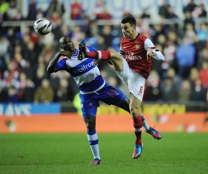 Framed Print : Arsenal vs. Reading: Laurent Koscielny Faces Off Against Jason Roberts in Capital One Cup Clash Framed Print : Arsenal vs. Reading: Laurent Koscielny Faces Off Against Jason Roberts in Capital One Cup Clash