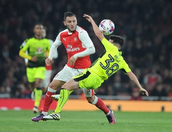 Arsenal vs. Reading: Lucas Perez Clashes with Liam Kelly in EFL Cup Showdown