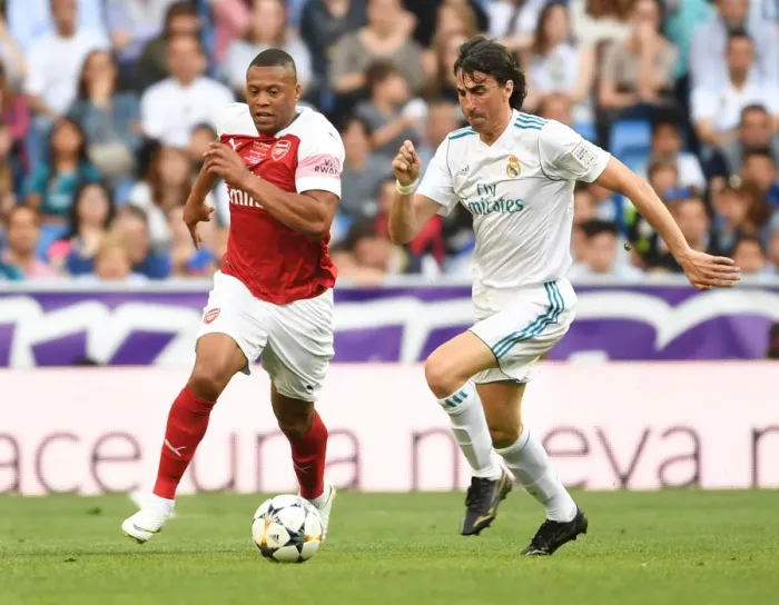 Framed Print : Arsenal vs. Real Madrid Legends Clash at Bernabeu (2018-19): A Battle of Football Greats