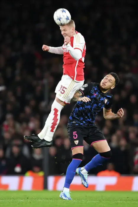 Framed Print : Arsenal vs Sevilla: A Champions League Showdown - Kiwior vs Ocampos Battle for Group B Dominance, 2023 / 24