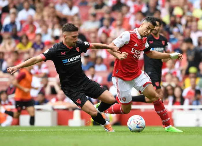 Framed Print : Arsenal vs Sevilla: Martinelli Takes on Jose Angel in Emirates Cup Clash (2022) Framed Print : Arsenal vs Sevilla: Martinelli Takes on Jose Angel in Emirates Cup Clash (2022)