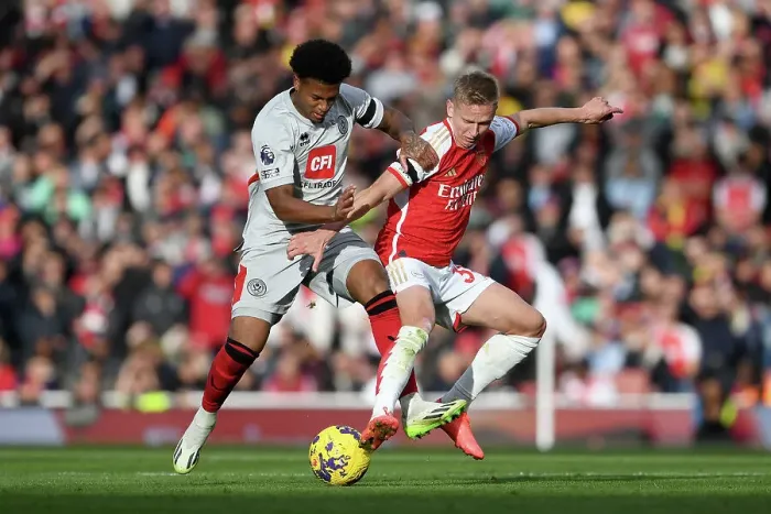 Framed Print : Arsenal vs Sheffield United: Intense Battle for the Ball in the 2023-24 Premier League Framed Print : Arsenal vs Sheffield United: Intense Battle for the Ball in the 2023-24 Premier League