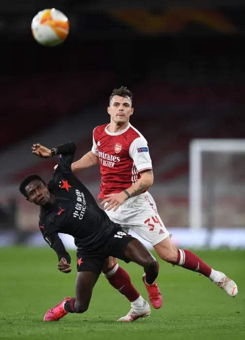 Framed Print : Arsenal vs Slavia Prague: Granit Xhaka Clashes in Empty Europa League Quarterfinal