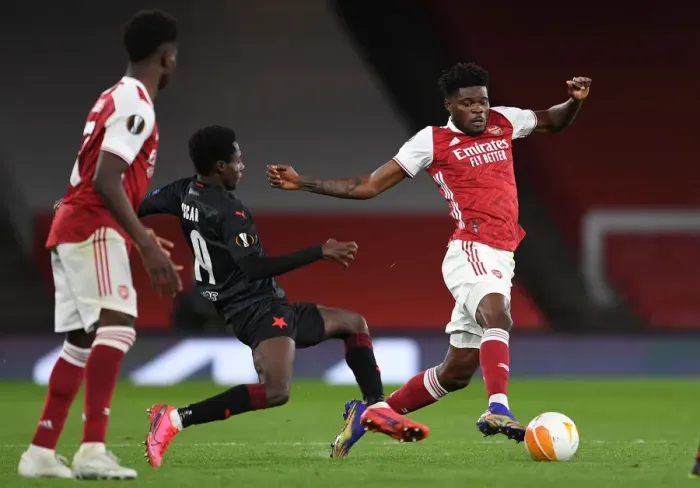 Framed Print : Arsenal vs Slavia Prague: Thomas Partey Clashes in UEFA Europa League Quarterfinal Amid Empty Stands Framed Print : Arsenal vs Slavia Prague: Thomas Partey Clashes in UEFA Europa League Quarterfinal Amid Empty Stands