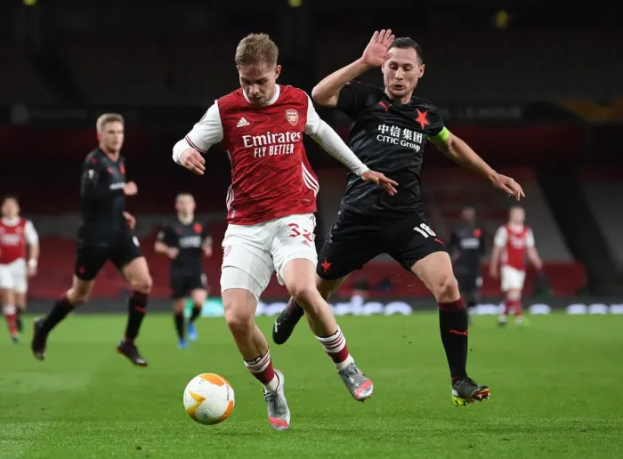 Framed Print : Arsenal vs Slavia Praha: Emile Smith Rowe Clashes with Jan Boril in Empty Europa League Quarterfinal Framed Print : Arsenal vs Slavia Praha: Emile Smith Rowe Clashes with Jan Boril in Empty Europa League Quarterfinal