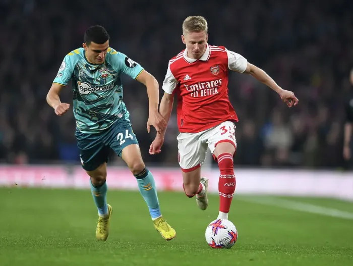 Framed Print : Arsenal vs Southampton: Clash between Zinchenko and Elyounoussi in the 2022-23 Premier League