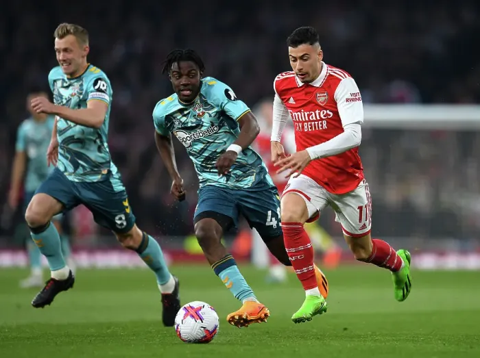 Framed Print : Arsenal vs. Southampton: Gabriel Martinelli Fights for Possession in Premier League Clash Framed Print : Arsenal vs. Southampton: Gabriel Martinelli Fights for Possession in Premier League Clash