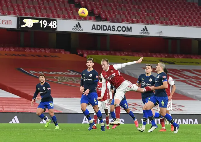 Framed Print : Arsenal vs Southampton: Holding's Header Hits the Crossbar in Empty Emirates Stadium Framed Print : Arsenal vs Southampton: Holding's Header Hits the Crossbar in Empty Emirates Stadium