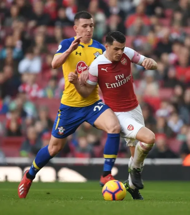 Framed Print : Arsenal vs. Southampton: Intense Battle between Xhaka and Hojbjerg