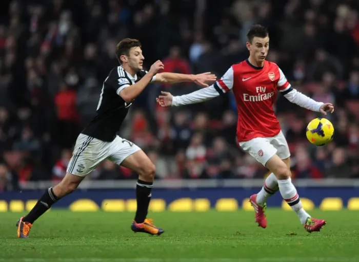 Framed Print : Arsenal vs Southampton: Koscielny Faces Off Against Lallana Framed Print : Arsenal vs Southampton: Koscielny Faces Off Against Lallana