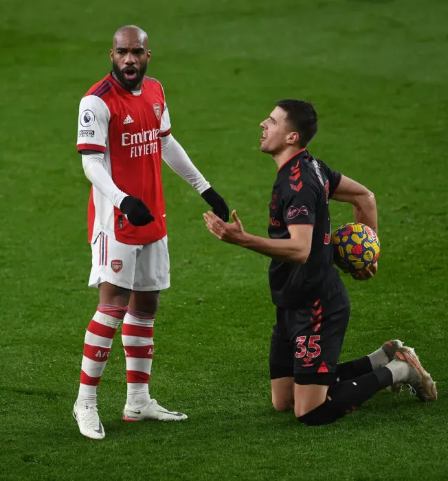 Framed Print : Arsenal vs. Southampton: Lacazette and Bednarek Clash in Premier League Showdown Framed Print : Arsenal vs. Southampton: Lacazette and Bednarek Clash in Premier League Showdown