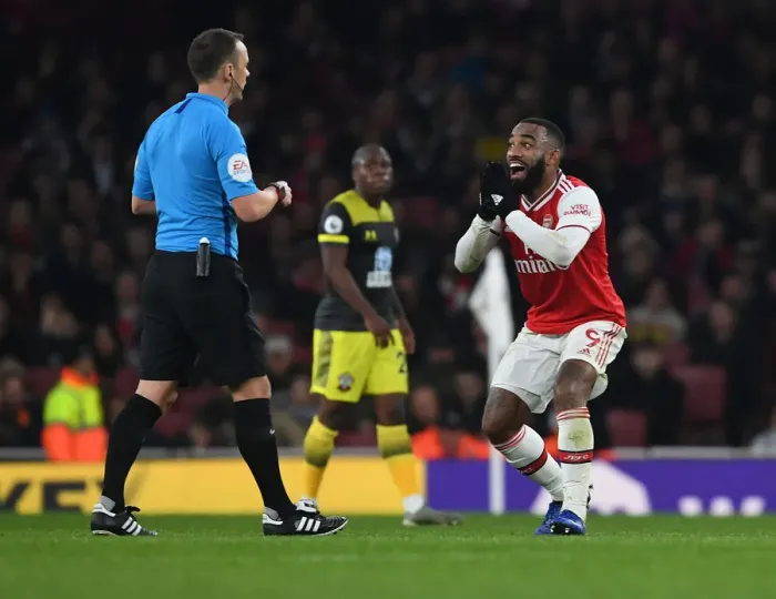 Framed Print : Arsenal vs Southampton: Lacazette Contests Referees Decision in Premier League Clash