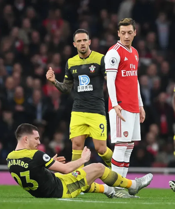 Framed Print : Arsenal vs Southampton: Ozil Stands Off Against Hojbjerg in Premier League Clash