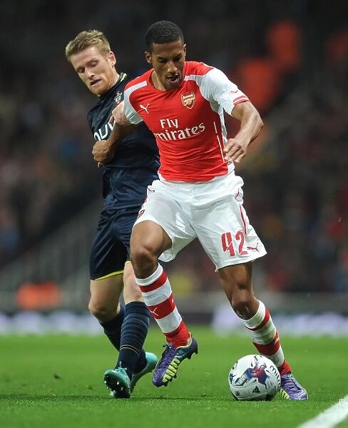 Arsenal vs. Southampton: Tense Battle between Isaac Hayden and Steven Davis (Capital One Cup 2014 / 15)