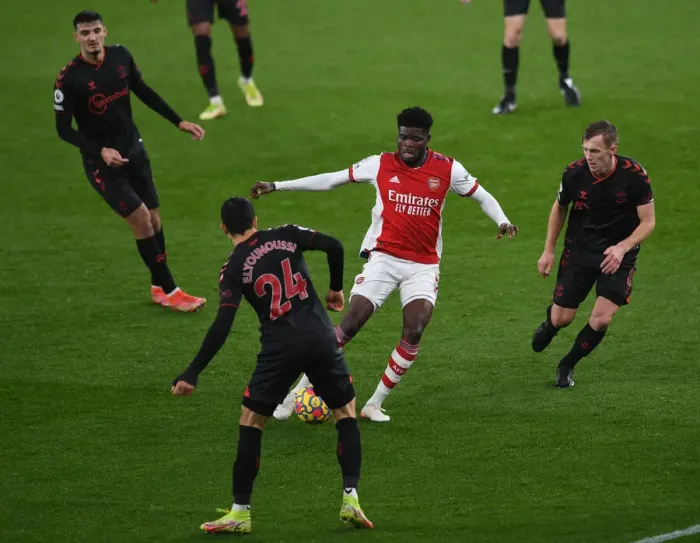 Framed Print : Arsenal vs Southampton: Thomas Partey Clashes with Ward-Prowse and Elyounoussi in Premier League Showdown