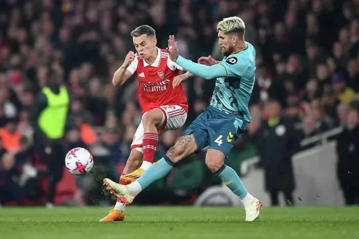 Framed Print : Arsenal vs. Southampton: Trossard Fights for Possession in Intense Premier League Clash